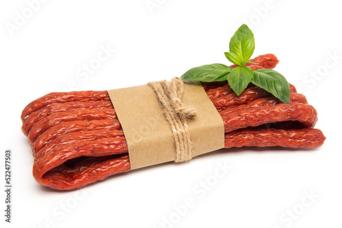 Thin Dry Smoked Pork or beef meat Polish Kabanos sausages Isolated on white background