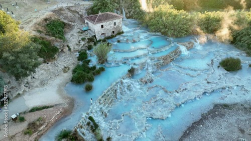 View from above, stunning aerial view of Le Cascate del Mulino, a group of beautiful hot springs in the municipality of Manciano, Tuscany