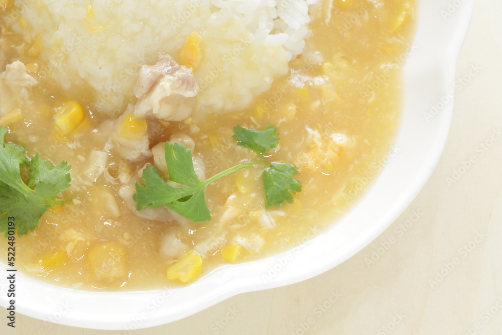 Chinese food, Chicken and sweet corn soup rice in white plate Chinese food, Chicken and sweet corn soup rice in white plate