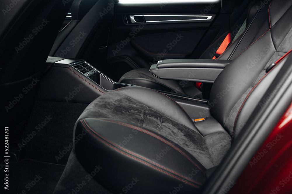 Luxury car rear seats row. Expensive car leather seats. Cozy and comfortable seats of vip transfer car 