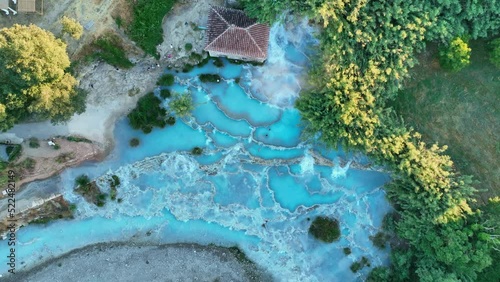 View from above, stunning aerial view of Le Cascate del Mulino, a group of beautiful hot springs in the municipality of Manciano, Tuscany
