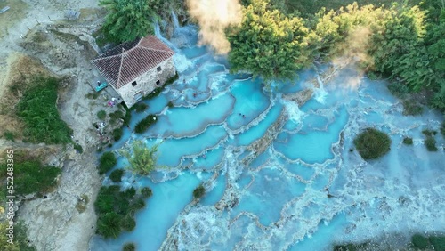 View from above, stunning aerial view of Le Cascate del Mulino, a group of beautiful hot springs in the municipality of Manciano, Tuscany
