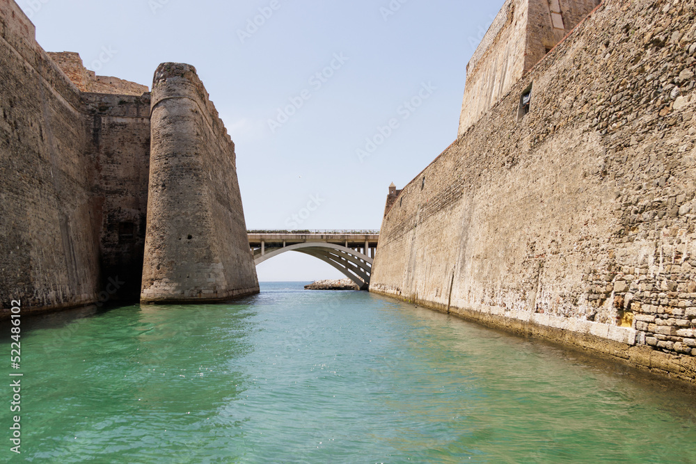 Fototapeta premium View from a tourist boat of the Royal Walls of Ceuta and its navigable moat