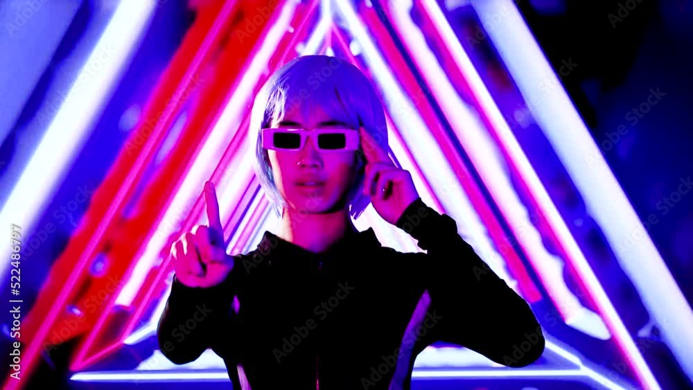 Metaverse concept, young asian woman wearing black glasses on motion 3d background. 4K video asian gamer girl futuristic style.