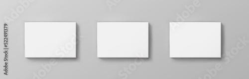 Blank paper sheets, picture canvas, wall displays isolated on gray background. Vector white posters with shadow A4 format mockup. Plastic banners, business cards or labels set