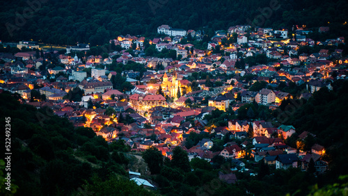 Aerial drone view of the Saint Nicholas Church in Brasov at night, Romania © frimufilms