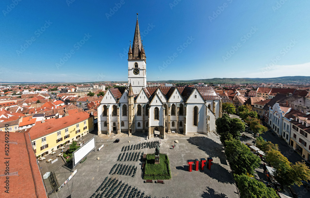 Aerial drone view of the Sibiu Lutheran Cathedral, Romania - obrazy, fototapety, plakaty 