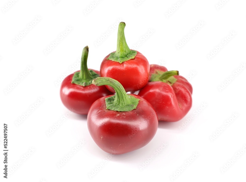 Round red chili peppers on white background. Cherry peppers Round red chili peppers on white background. Cherry peppers