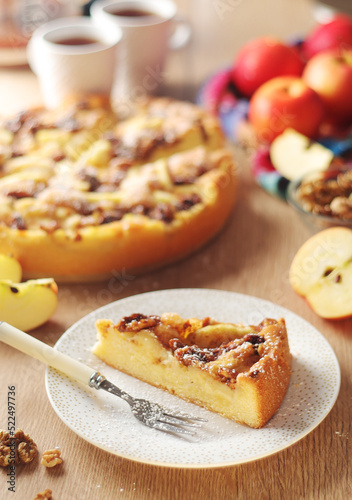 Apple pie with walnuts - typical autumn dish