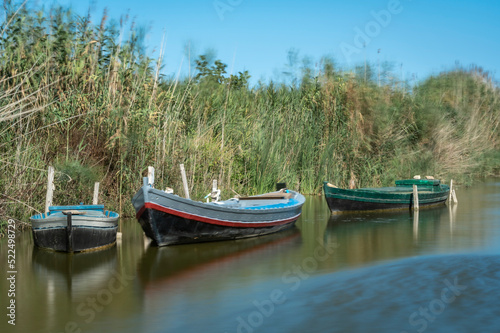 Fototapeta Naklejka Na Ścianę i Meble -  Fishing traditional wood boats in the lake.