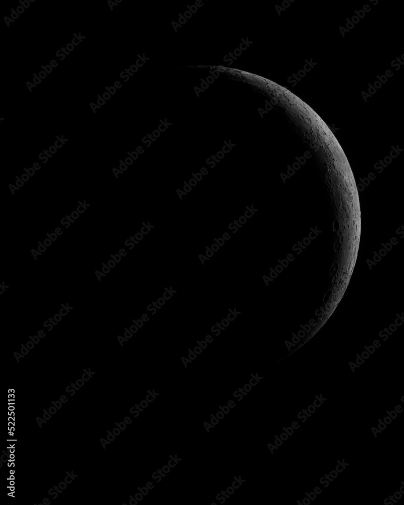 crescent moon against black night sky background crescent moon against black night sky background