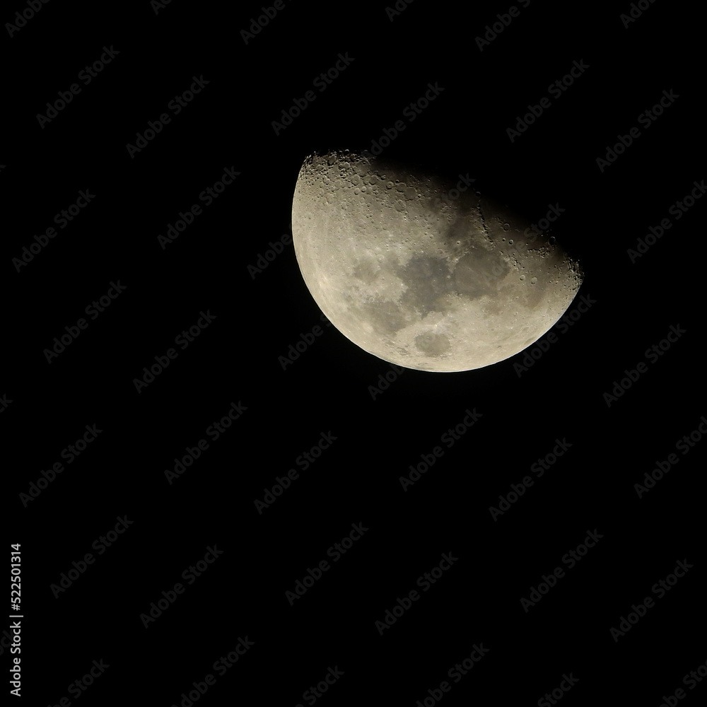 Half moon on black sky background at night Half moon on black sky background at night