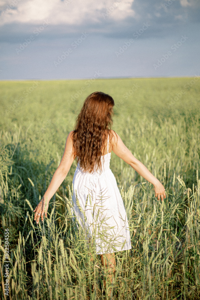 Girl in wheat field