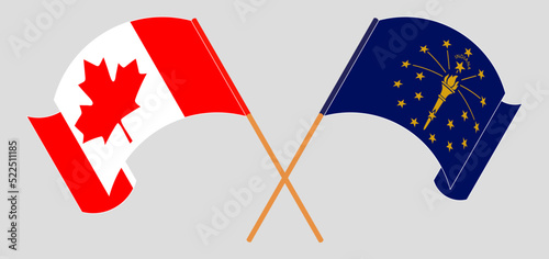 Crossed and waving flags of Canada and the State of Indiana