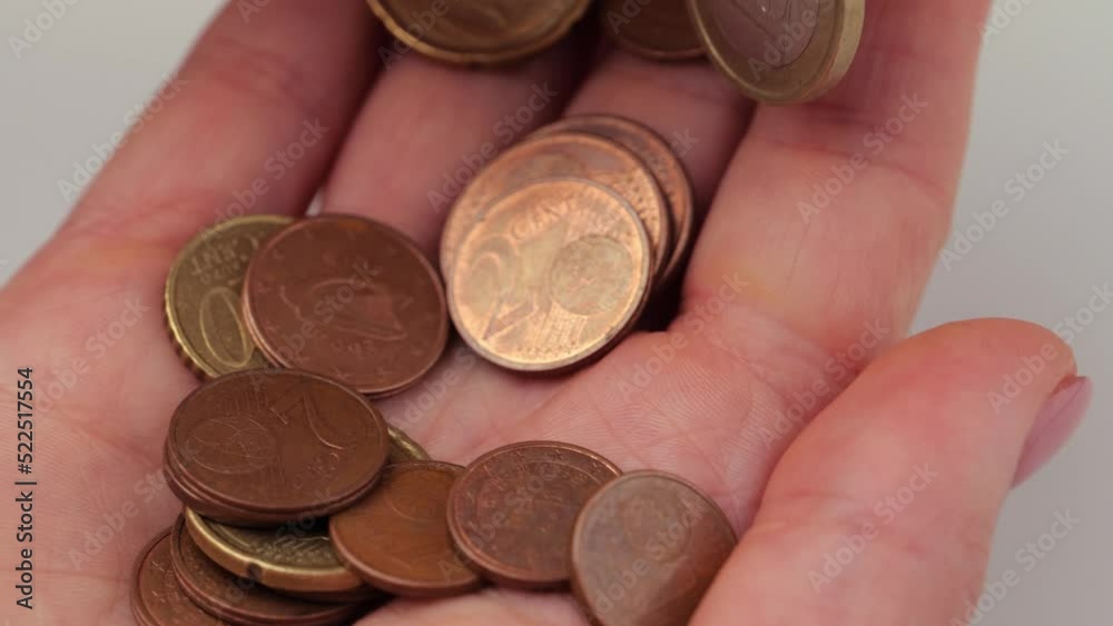 Close-up of woman's hands counting euro cents. Poverty instability. Close-up of woman's hands counting euro cents. Poverty instability.