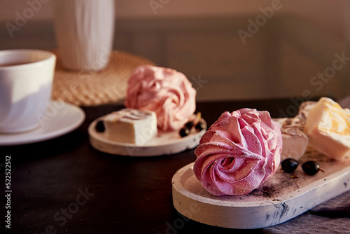 Wallpaper Mural Natural homemade sugar and gluten free purple marshmallows with currant taste in low key and cup of tea. Autumn cozy atmosphere. Healthy sweets, natural food Torontodigital.ca