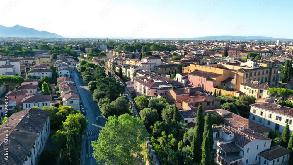 Pisa homes and streets at dawn from drone
