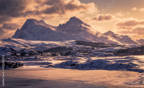 Wonderful Wintry Landscape. Snowcapped mountains, glacier lagoon, under sumlight during sunset. Wonderful winter landscape of frosty, sunny morning. Stunning view of winter nature of Norway.