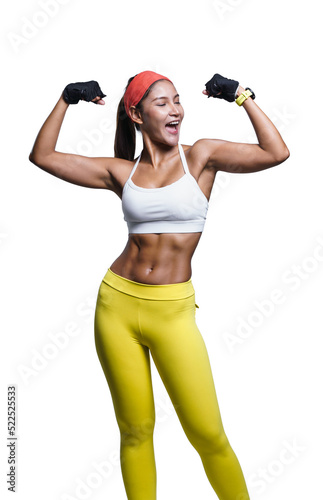 Portrait of hapiness Asian sport woman stretching with confidence and smile over white background. Healthy girl showing her slim body with tan skin.