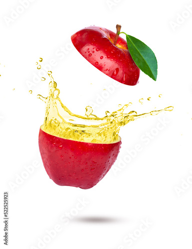 Foto Red apple with apple cider vinegar or juice splash