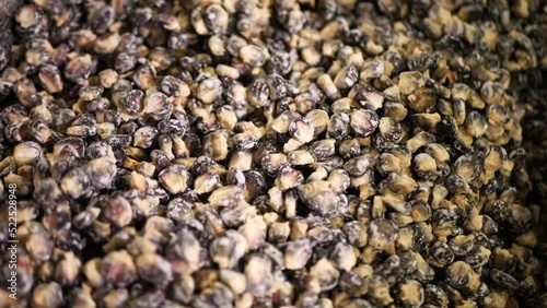 Blue corn is being nixtamalized for creating tortilla dough  photo