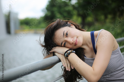 Young attractive woman portrait at outdoor.