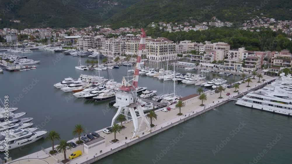 Aerial view on the hotels and yachts in marina in Montenegro.
Aerial view on the hotels and yachts in marina in Montenegro.