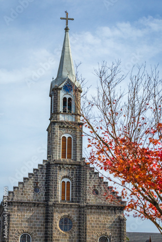 Gramado stone church at golden autumn, Gramado, Southern Brazil