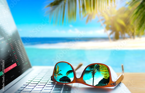 Fototapeta Naklejka Na Ścianę i Meble -  Art remote work in a tropical pool. Dream work office background