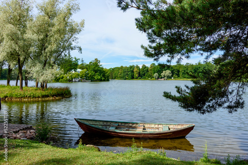 Fototapeta Naklejka Na Ścianę i Meble -  Boat on Grand pond of Catherine park in summer, Tsarskoe Selo (Pushkin), Saint Petersburg, Russia