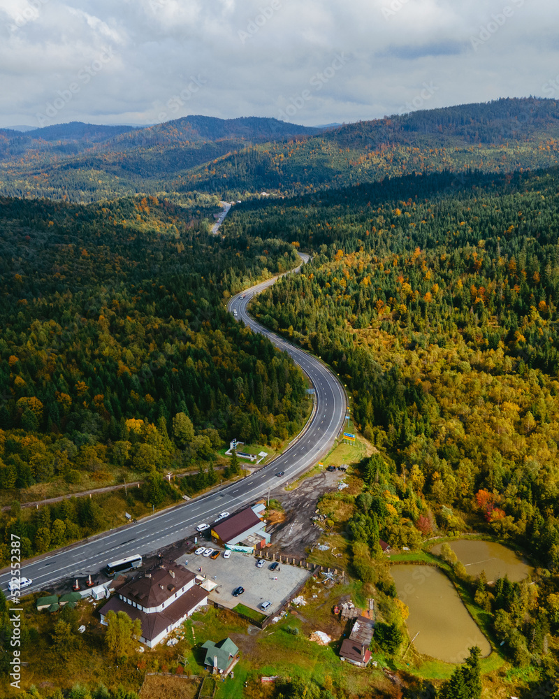 aerial view of speedway road in autumn carpathian mountains aerial view of speedway road in autumn carpathian mountains