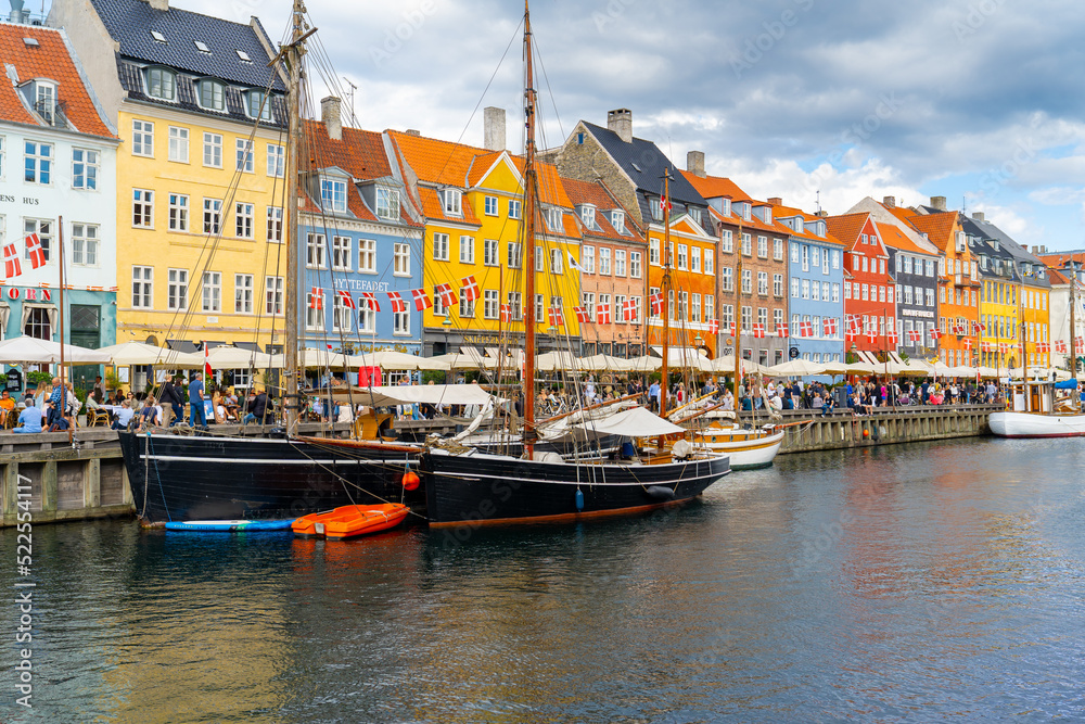 Nyhavn canal It is a sightseeing and entertainment district with old ships and colorful houses from the 17th and early 18th centuries. 19 July 2022 Copenhagen, Denmark 