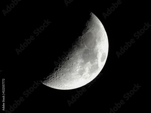 half moon in dark night sky