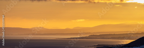 sunset over the river amber