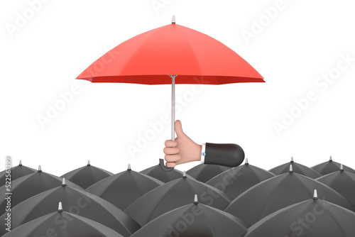 Uniqueness and individuality. Hand holding a red umbrella among people with black umbrellas.