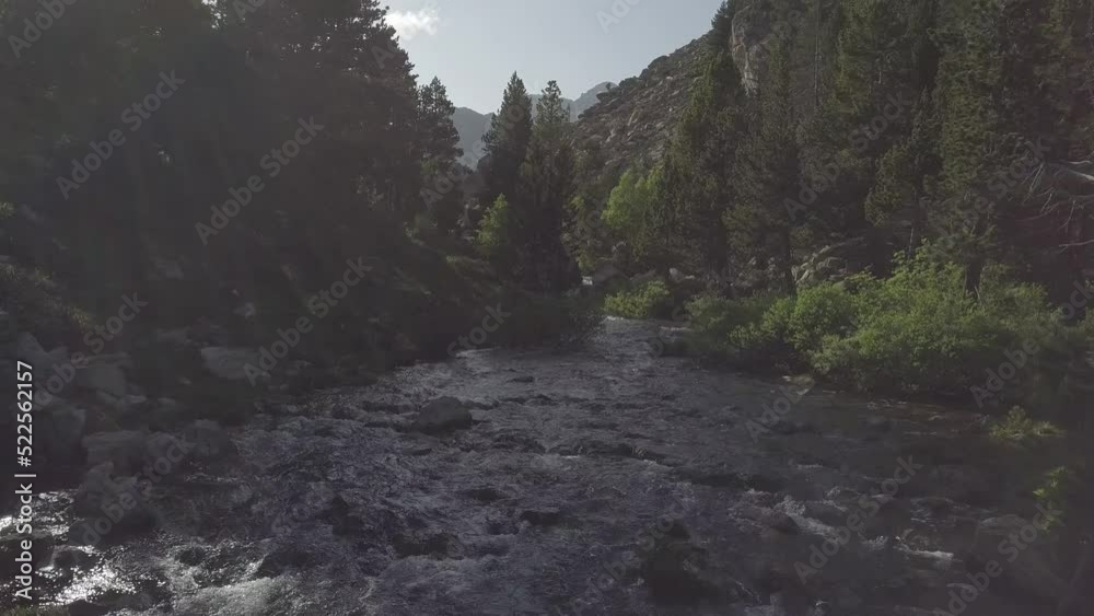 Drone video of river running down the mountain in the alps Drone video of river running down the mountain in the alps