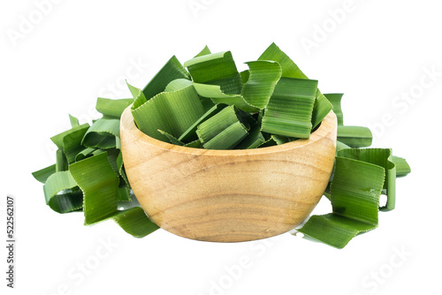 pandan and Chopped pandan in a wooden cup isolated on a white background. photo