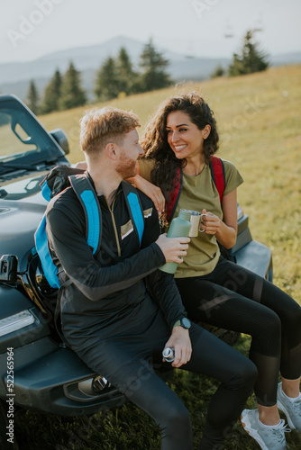 Young couple relaxing on a ...