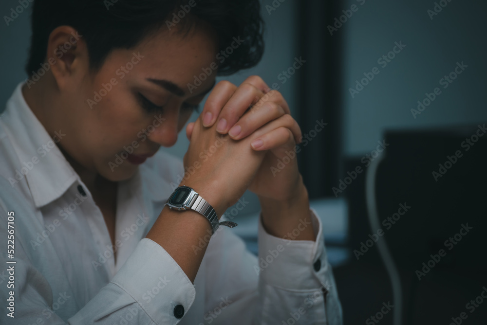 Pray and bible concept. Hand in hand together on bible by woman (worship christian), thinking and closed her eyes at church. Person side view, female praying, hope for peace. Pray and bible concept. Hand in hand together on bible by woman (worship christian), thinking and closed her eyes at church. Person side view, female praying, hope for peace.