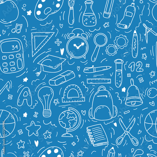 Hand drawn doodle seamless pattern with school icons on blue background. Vector illustration of supplies, back to school concept for print, web and textile design, stationery