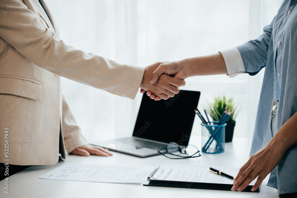Close up of business person hands Employer interviewing job applicants, talking about resume and experience. Close up of business person hands Employer interviewing job applicants, talking about resume and experience.