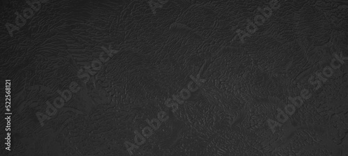 Black anthracite gray dark acrylic or oil paint texture. Closeup of the painting. Colorful abstract painting background with sponge swab © Corri Seizinger