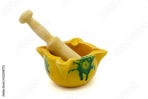 Mortar, utensil composed of a concave container and a 'maja', to grind or crush food or condiments. photo