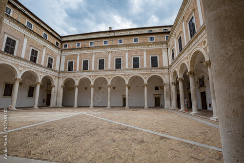 Beautiful places of Italy. View of renaissance courtyard of the Ducal Palace of Urbino , city and World Heritage Site in Marche region, Italy. © ILLYA