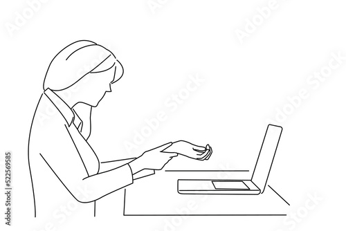 Cartoon of businesswoman with a laptop suffering from carpal tunnel syndrome. Outline drawing style art