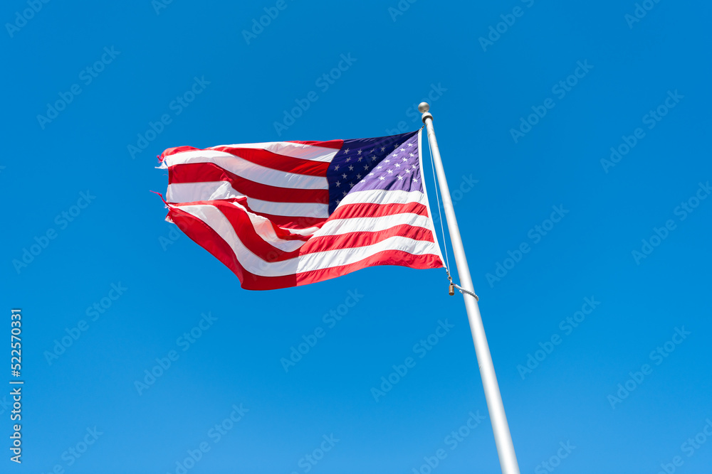 patriotic usa flag on blue sky background