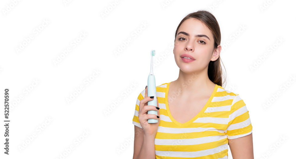young girl with electric toothbrush isolated on white background young girl with electric toothbrush isolated on white background