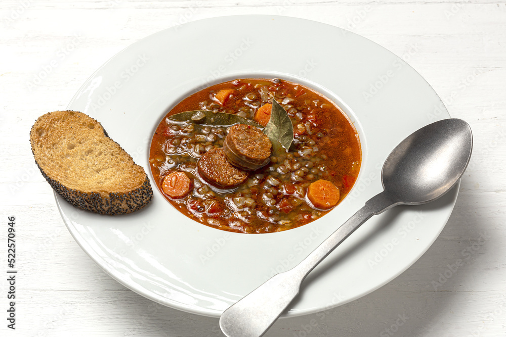 Homemade lentil stew with vegetables and chorizo Homemade lentil stew with vegetables and chorizo