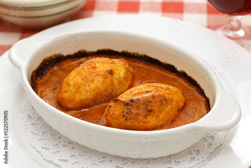 homemade quenelle (fluffy fish dumplings with creamy crayfish sauce ), French Lyonnais cuisine photo