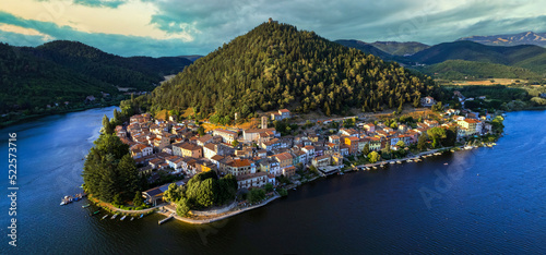 Fototapeta Naklejka Na Ścianę i Meble -  Most beautiful scenic Italian lakes - small picturesque lake Piediluco with colorful houses in Umbria, Terni province. Aerial panoramic view